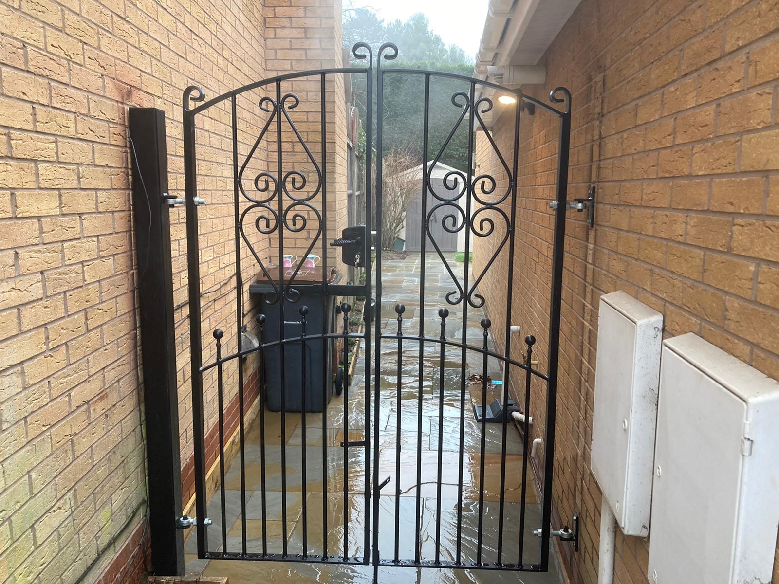 Marquis double wrought iron side gates