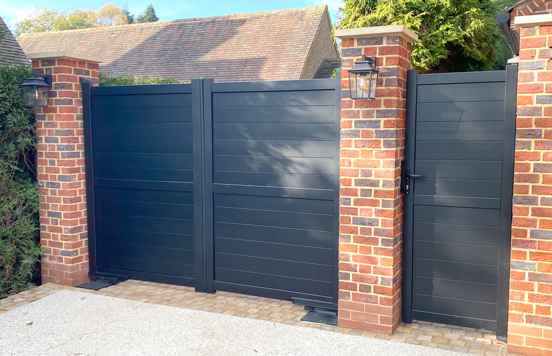 Horizontally boarded aluminium driveway and pedestrian access gates