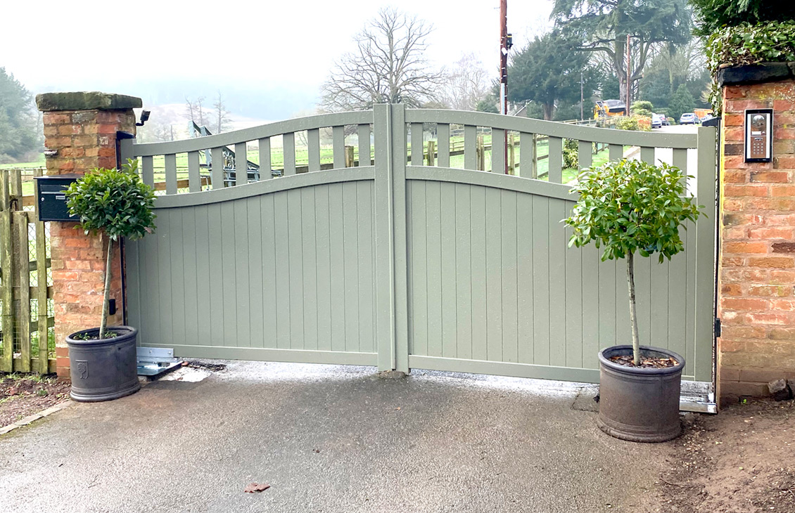 Arch top aluminium driveway gates with a non standard RAL colour