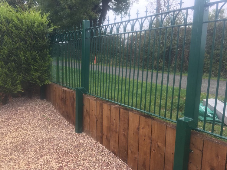 Wrought iron railings powder coated green