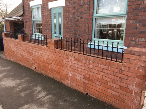 Manor ball top wrought iron railings fitted to wall of Chester property