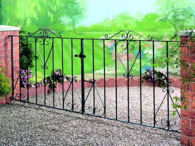 Decorative wrought iron style metal driveway gates